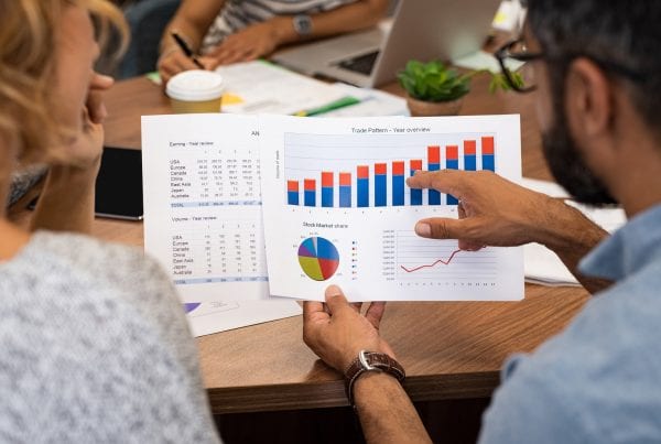 Business people analyzing graphs