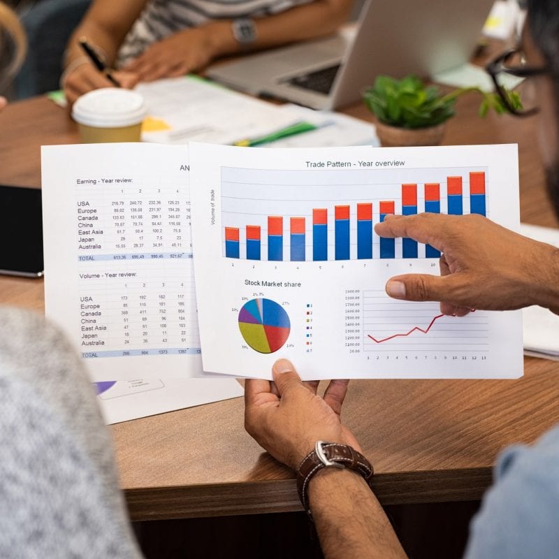 Business people analyzing graphs